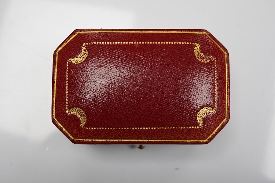 A 1930's/1940's Cartier gilt tooled leather cufflink box, of octagonal form, 83mm by 54mm. Condition - poor to fair